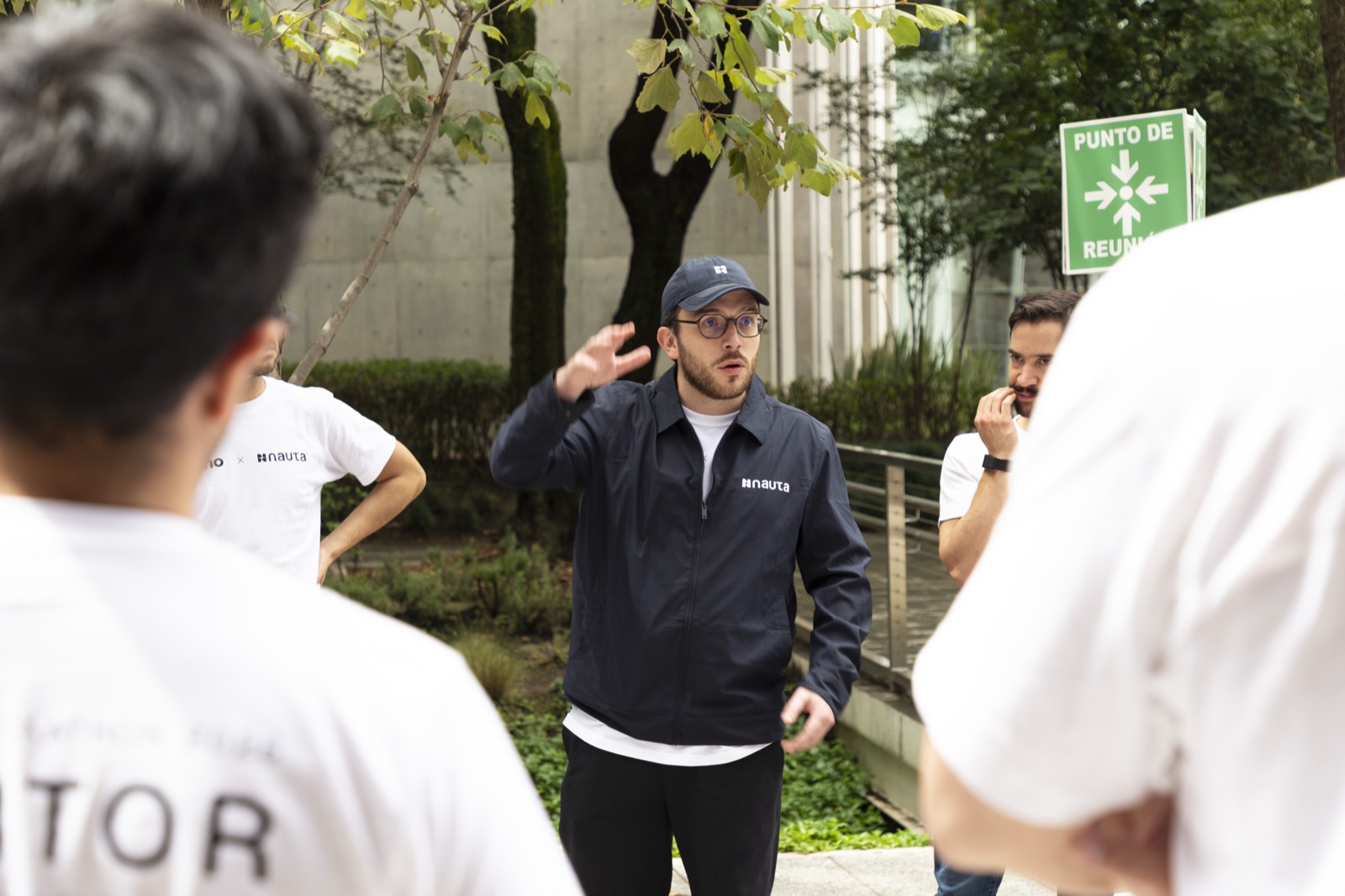A Nauta engineer mentoring a team at NextWave Hackathon 2026